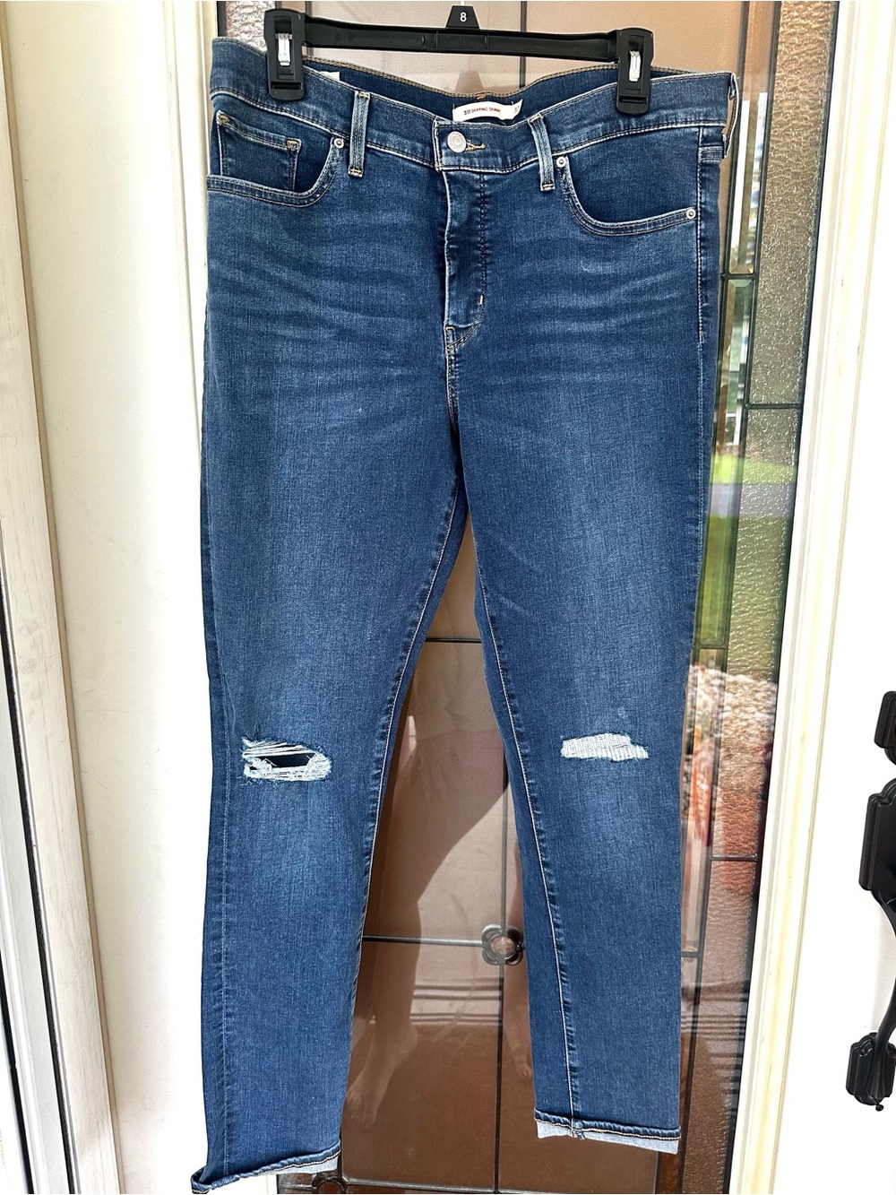 Levi's Women's 311 Shaping Skinny Jeans in Dark Blue with Knee Distress